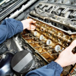 machanic repairman at automobile car engine repair